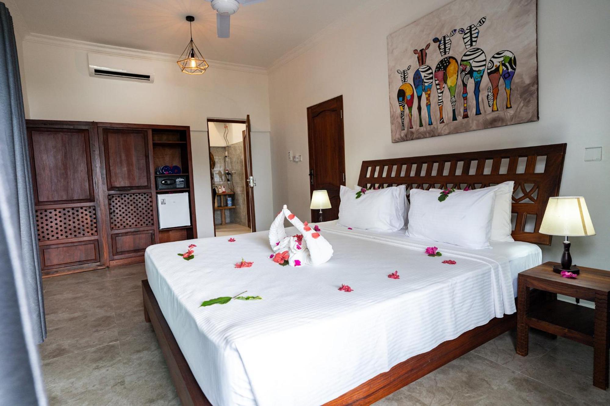 Manolo Beach Resort Uroa Rum bild