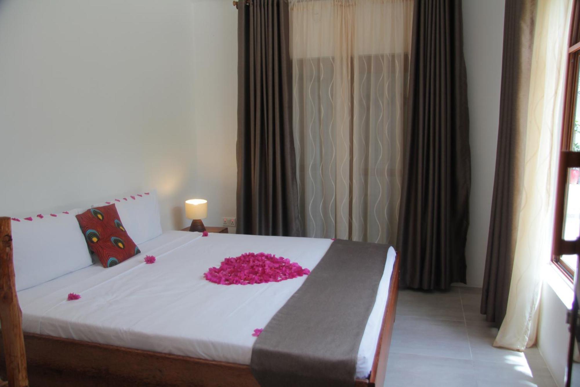 Manolo Beach Resort Uroa Rum bild